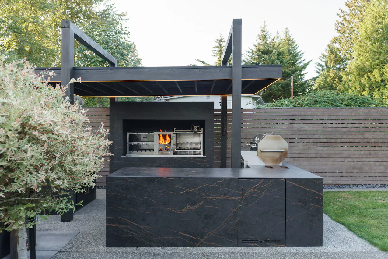 Outdoor kitchen with a dark porcelain countertop